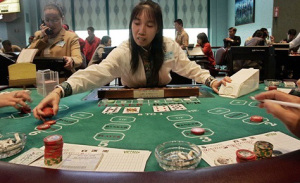 Chinese baccarat dealer